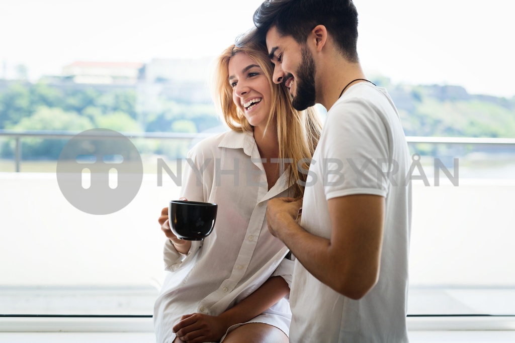 Couple Enjoying A Morning Coffee