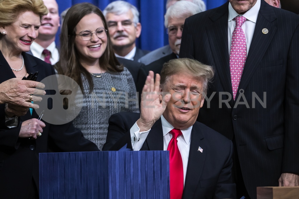 US President Donald J. Trump arrives to sign the Agriculture