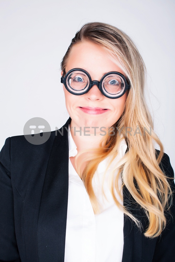 bookworm, cute young blond woman in glasses, blond hair, teenage goofy ...