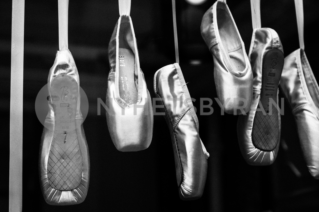 Row of hanging ballet shoes, London, England, United Kingdom