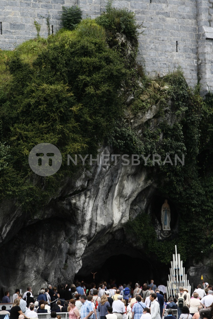 Pilgrims Outside The Lourdes Grotto - B